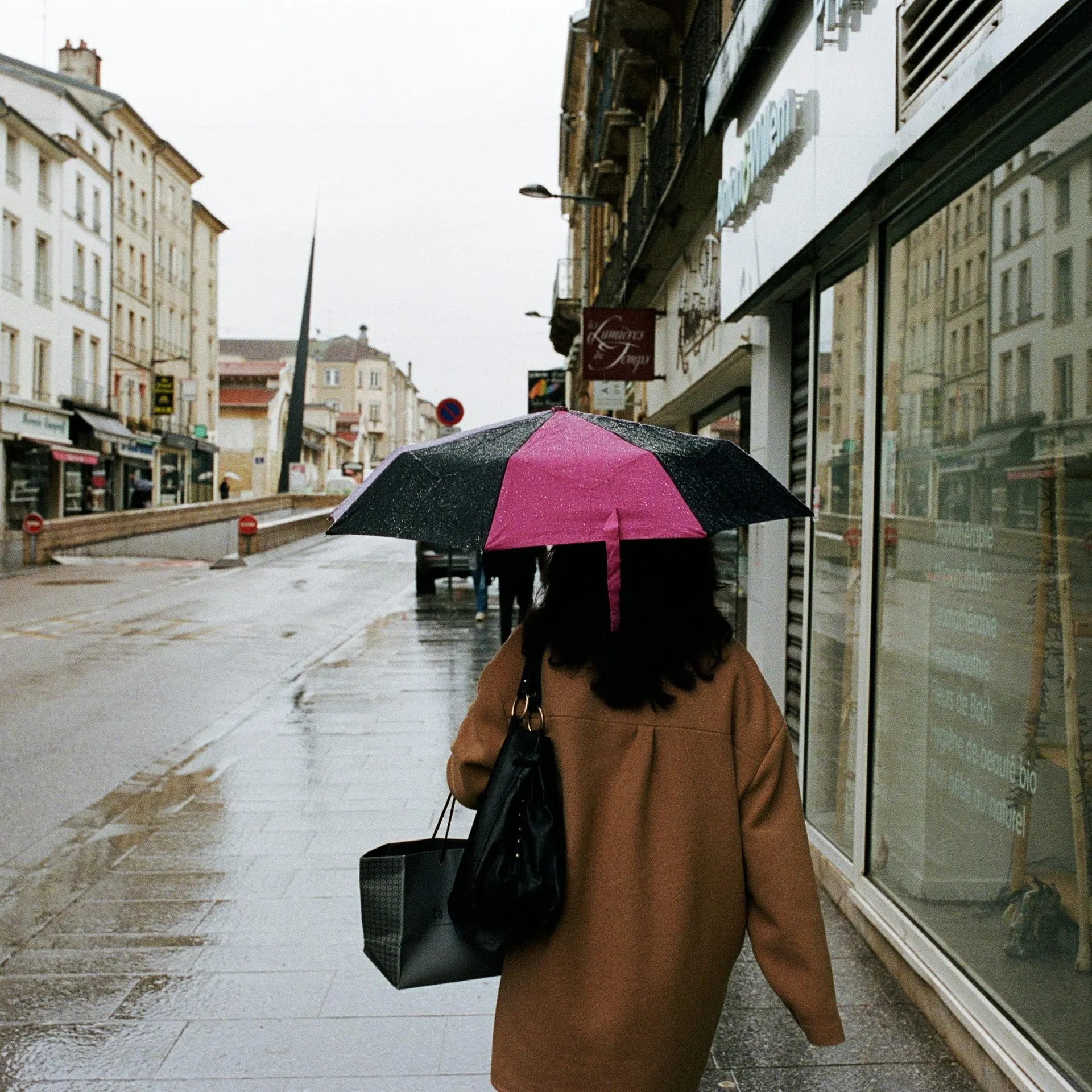 Traveller seated near colourful streets during an intimate Irish evening